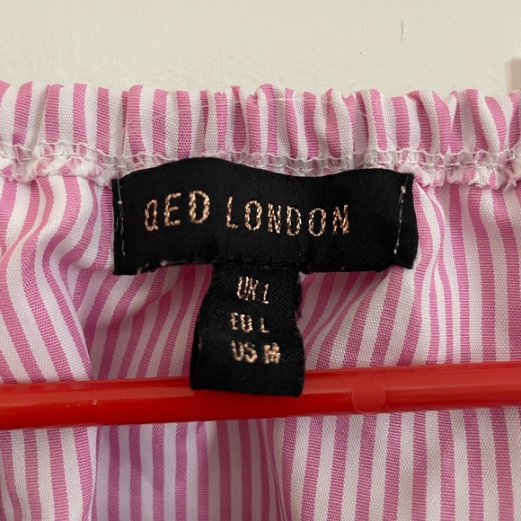 QED London Off Shoulder Crop Top With Pom
Pom Trim - Picture 6 of 6